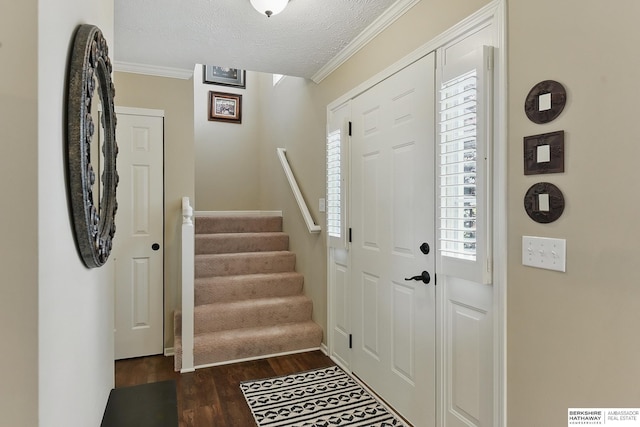 5818 S 159th St, Omaha, NE 68135 - foyer entrance featuring dark wood-type flooring, stairway, a textured ceiling, and ornamental molding