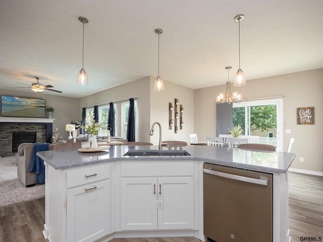 15218 Vane St, Bennington, NE 68007 - kitchen featuring dishwasher, healthy amount of natural light, a ceiling fan, and dark wood-style flooring