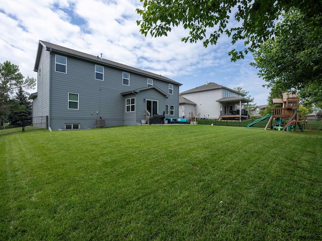 15218 Vane St, Bennington, NE 68007 - rear view of property with a playground