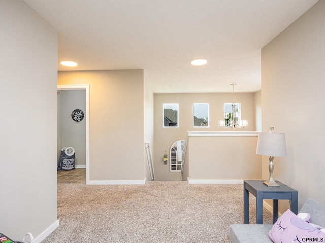 15218 Vane St, Bennington, NE 68007 - hallway featuring carpet floors, a chandelier, recessed lighting, and an upstairs landing