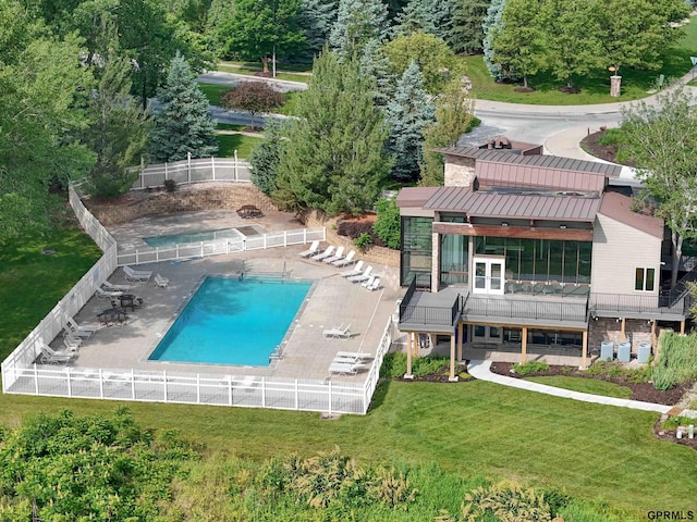15218 Vane St, Bennington, NE 68007 - community pool with a fenced backyard and a patio area
