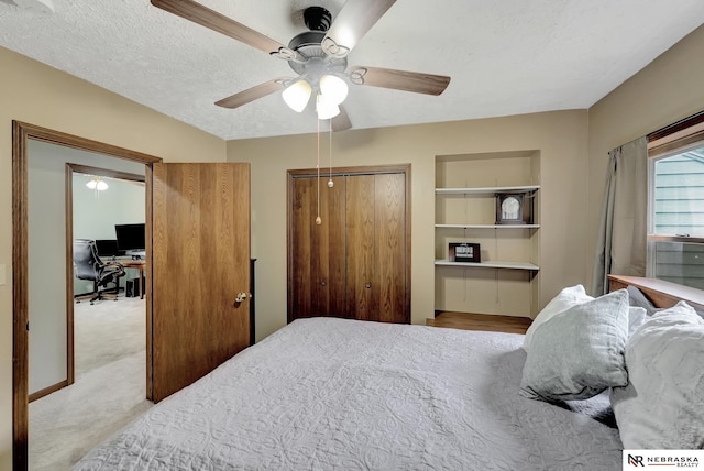 7105 W Davey Rd, Raymond, NE 68428 - bedroom featuring a desk, ceiling fan, and a textured ceiling