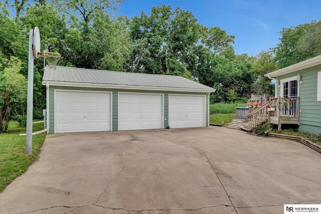 7105 W Davey Rd, Raymond, NE 68428 - detached garage with view of wooded area