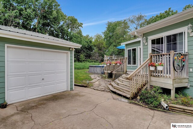 7105 W Davey Rd, Raymond, NE 68428 - garage featuring concrete driveway