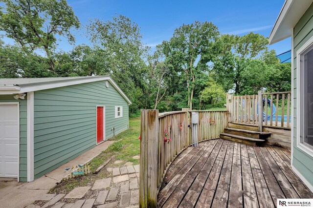 7105 W Davey Rd, Raymond, NE 68428 - wooden terrace with view of wooded area