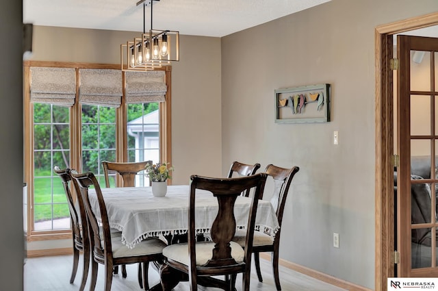 7105 W Davey Rd, Raymond, NE 68428 - dining area with baseboards and light wood-type flooring