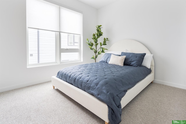 5320 Elmwood Plz, Omaha, NE 68106 - carpeted bedroom featuring baseboards