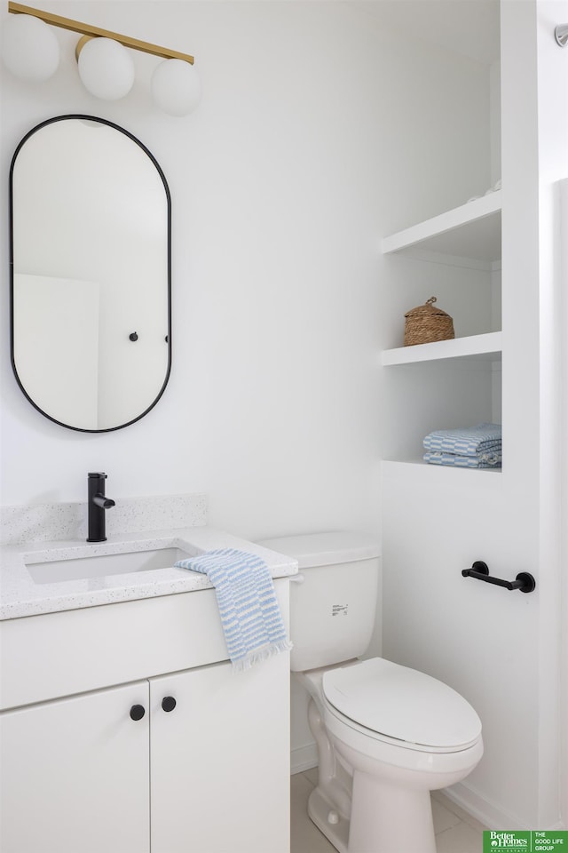 5320 Elmwood Plz, Omaha, NE 68106 - bathroom with vanity, toilet, and baseboards