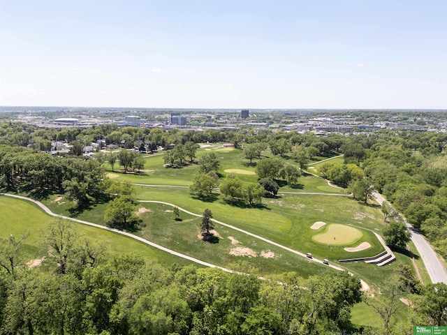 5320 Elmwood Plz, Omaha, NE 68106 - aerial view of property and surrounding area featuring a golf course and a tree filled landscape
