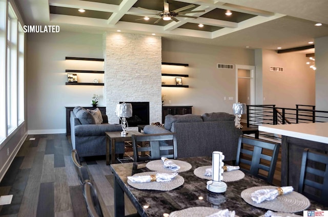 512 Deep Water Bay, Lincoln, NE 68527 - dining space with coffered ceiling, dark wood finished floors, ceiling fan, a fireplace, and beamed ceiling