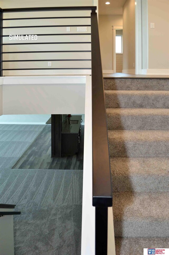 512 Deep Water Bay, Lincoln, NE 68527 - stairs featuring carpet flooring and recessed lighting