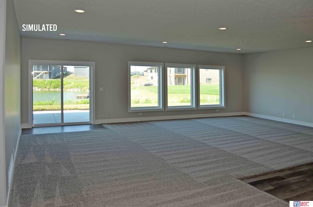 512 Deep Water Bay, Lincoln, NE 68527 - unfurnished room with baseboards, carpet floors, and recessed lighting