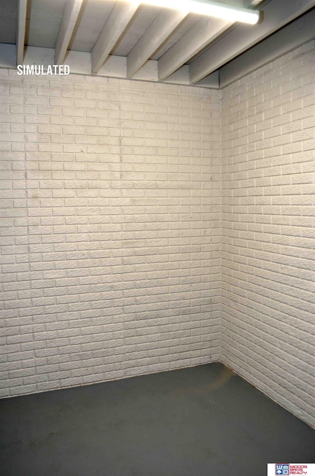 512 Deep Water Bay, Lincoln, NE 68527 - basement featuring brick wall
