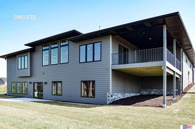 512 Deep Water Bay, Lincoln, NE 68527 - rear view of property with a lawn and a balcony