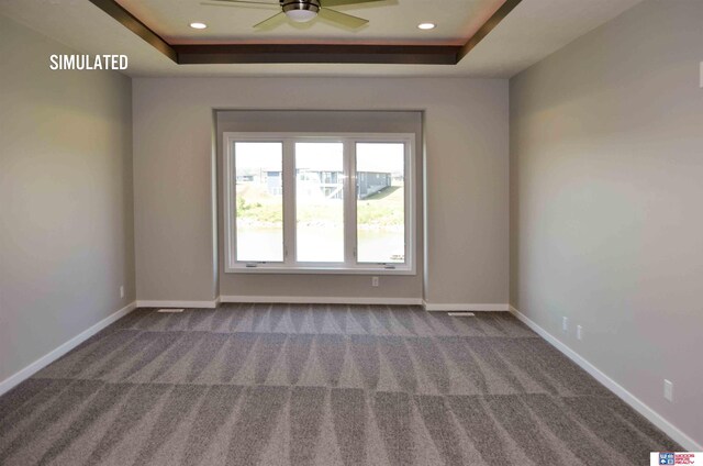 512 Deep Water Bay, Lincoln, NE 68527 - carpeted empty room with a ceiling fan, a tray ceiling, baseboards, and recessed lighting