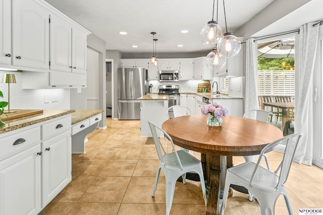 17310 I St, Omaha, NE 68135 - dining area featuring recessed lighting and light tile patterned floors
