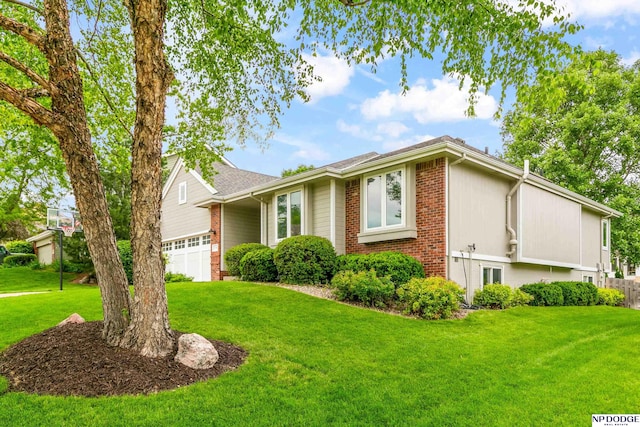 17310 I St, Omaha, NE 68135 - view of front of home with brick siding, a front lawn, and an attached garage