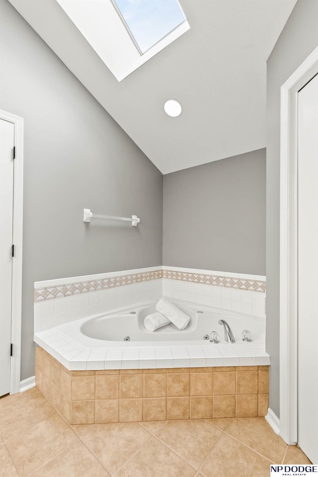 17310 I St, Omaha, NE 68135 - bathroom with a whirlpool tub, tile patterned flooring, and a skylight