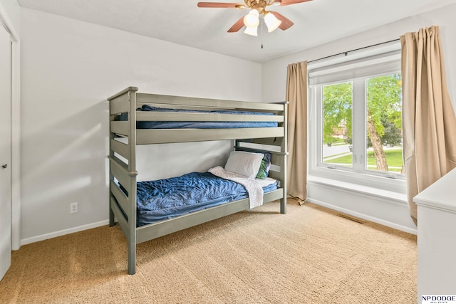 17310 I St, Omaha, NE 68135 - carpeted bedroom featuring baseboards and ceiling fan