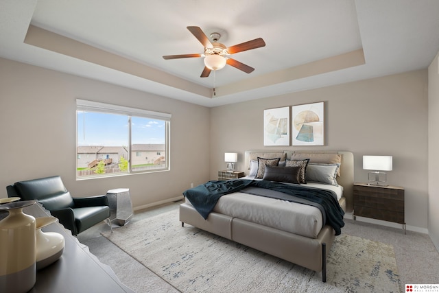 7775 N 149th St, Bennington, NE 68007 - carpeted bedroom with a raised ceiling, baseboards, and a ceiling fan