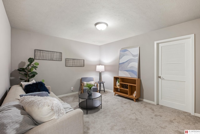 7775 N 149th St, Bennington, NE 68007 - living room with carpet floors, baseboards, and a textured ceiling
