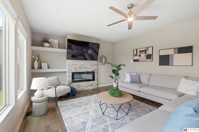 7775 N 149th St, Bennington, NE 68007 - living room featuring baseboards, wood finished floors, and healthy amount of natural light