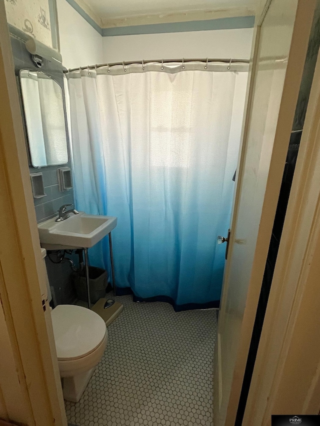 2031 N 49th St, Omaha, NE 68104 - full bathroom with a shower with shower curtain and tile patterned flooring