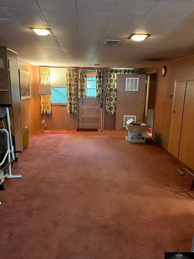 2031 N 49th St, Omaha, NE 68104 - basement with wooden walls and carpet