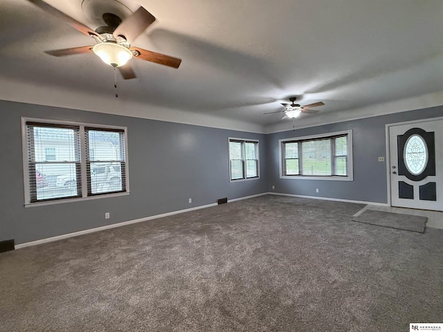 3836 Drexel St, Omaha, NE 68107 - carpeted empty room with a ceiling fan and baseboards