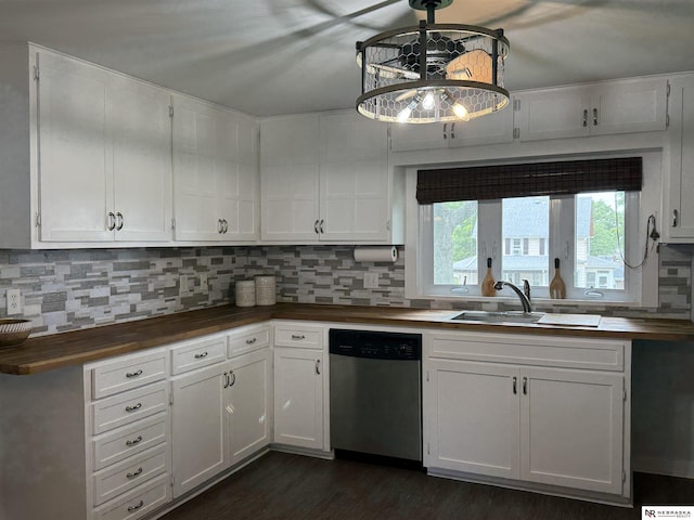 3836 Drexel St, Omaha, NE 68107 - kitchen featuring dishwasher, butcher block countertops, a sink, white cabinetry, and decorative backsplash