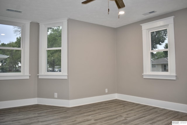 116 8th St, Scribner, NE 68057 - empty room featuring wood finished floors, baseboards, and a ceiling fan