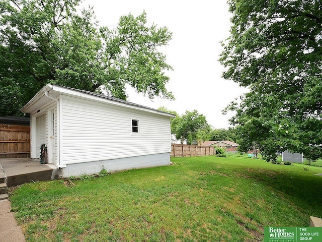 1609 N 71st St, Lincoln, NE 68505 - view of yard with a garage