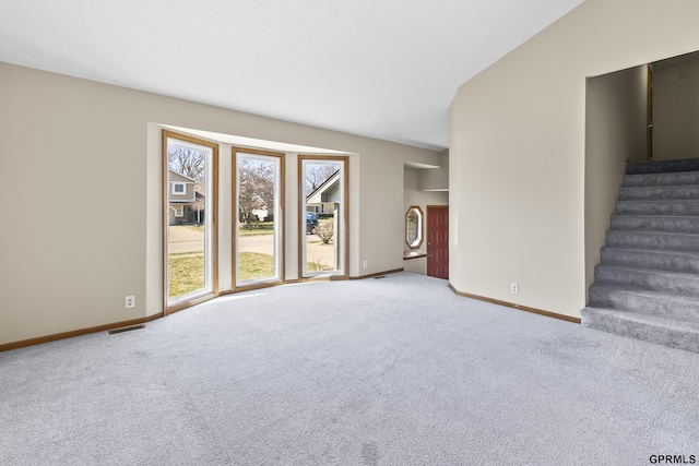 10103 S 11th St, Bellevue, NE 68123 - unfurnished living room with carpet, baseboards, and stairs