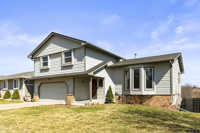 10103 S 11th St, Bellevue, NE 68123 - tri-level home featuring an attached garage and driveway