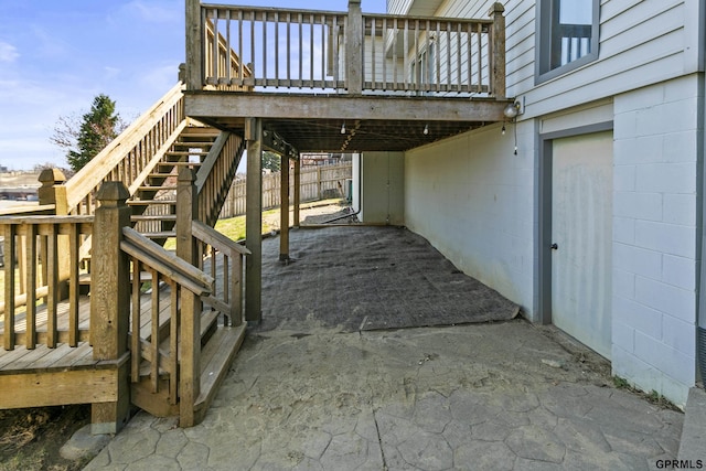 10103 S 11th St, Bellevue, NE 68123 - view of patio featuring stairs, a deck, and an attached garage