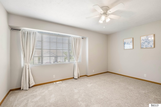 3015 N 144th Ter, Omaha, NE 68116 - carpeted empty room featuring ceiling fan and baseboards