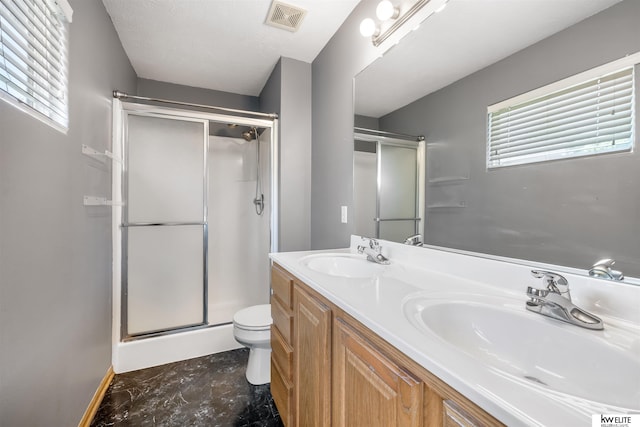 3015 N 144th Ter, Omaha, NE 68116 - full bathroom featuring toilet, a stall shower, plenty of natural light, and double vanity