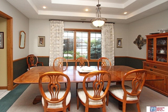 2600 Evergreen Cir, Beatrice, NE 68310 - dining space with a tray ceiling, recessed lighting, a wainscoted wall, and carpet flooring