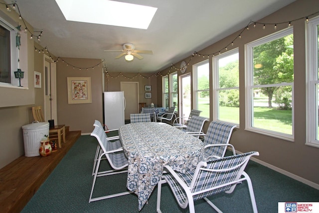 2600 Evergreen Cir, Beatrice, NE 68310 - sunroom / solarium featuring a skylight and baseboards