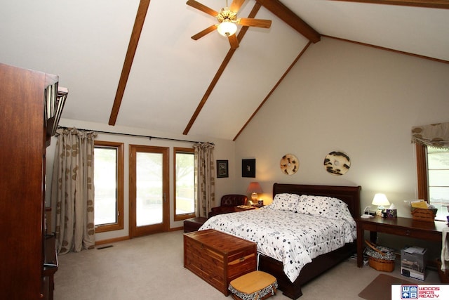 2600 Evergreen Cir, Beatrice, NE 68310 - bedroom with high vaulted ceiling, light colored carpet, beam ceiling, a ceiling fan, and access to exterior