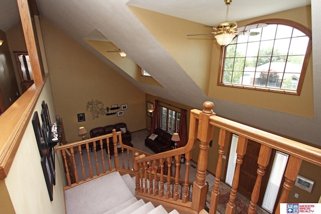 2600 Evergreen Cir, Beatrice, NE 68310 - stairway featuring ceiling fan and a high ceiling