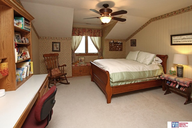 2600 Evergreen Cir, Beatrice, NE 68310 - bedroom featuring light carpet, wallpapered walls, lofted ceiling, and a ceiling fan