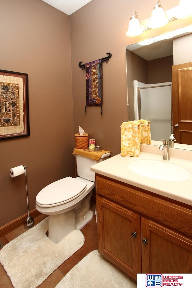 2600 Evergreen Cir, Beatrice, NE 68310 - full bathroom with vanity, toilet, and a shower