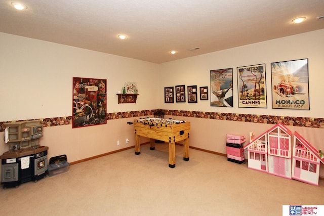 2600 Evergreen Cir, Beatrice, NE 68310 - recreation room with carpet, recessed lighting, and baseboards