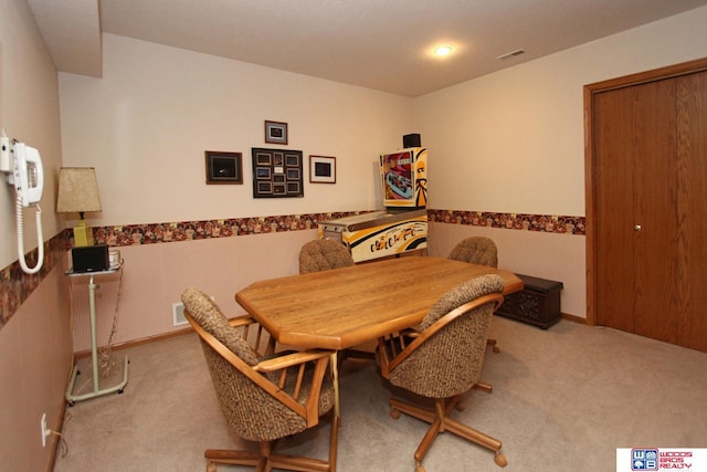 2600 Evergreen Cir, Beatrice, NE 68310 - dining area featuring carpet floors and wainscoting