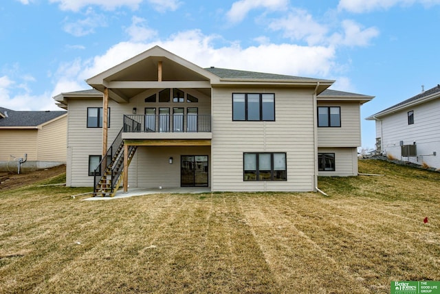 3639 S 218th Ave, Elkhorn, NE 68022 - rear view of house featuring a yard, stairway, a patio area, and cooling unit