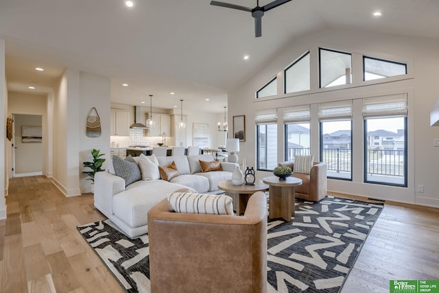 3639 S 218th Ave, Elkhorn, NE 68022 - living area featuring a ceiling fan, light wood finished floors, recessed lighting, baseboards, and high vaulted ceiling