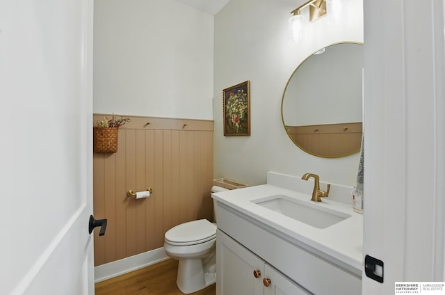 11065 N 171st St, Bennington, NE 68007 - half bath featuring vanity, toilet, and wood finished floors