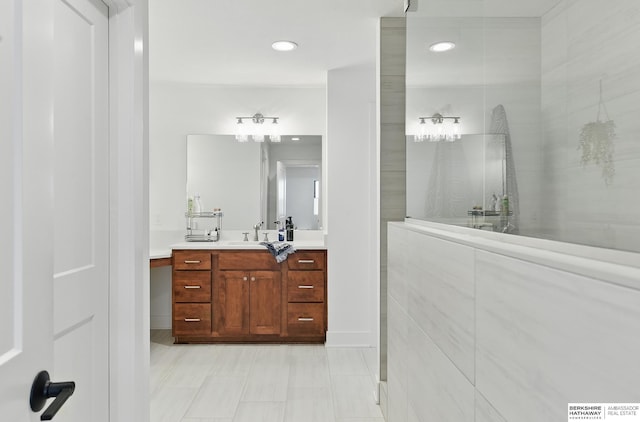 11065 N 171st St, Bennington, NE 68007 - full bathroom featuring vanity, walk in shower, and recessed lighting