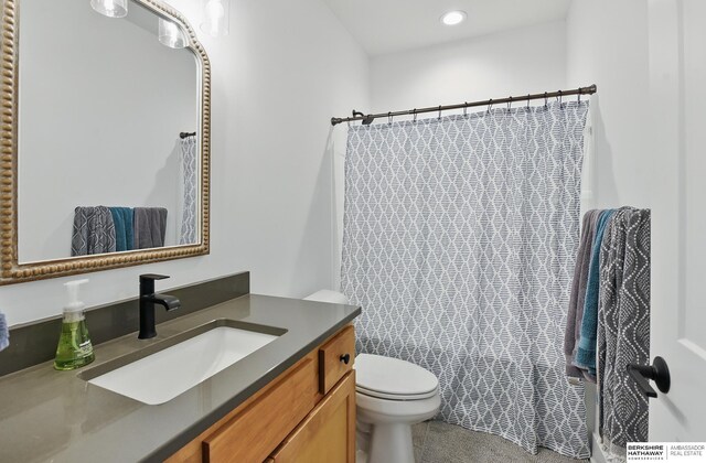 11065 N 171st St, Bennington, NE 68007 - bathroom with toilet, vanity, a shower with curtain, and recessed lighting